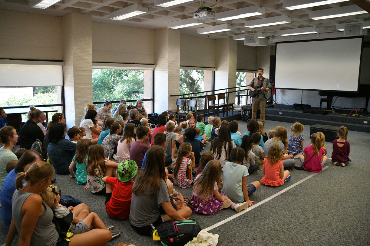 Singing zoologist Lucas Miller visits Bryan library